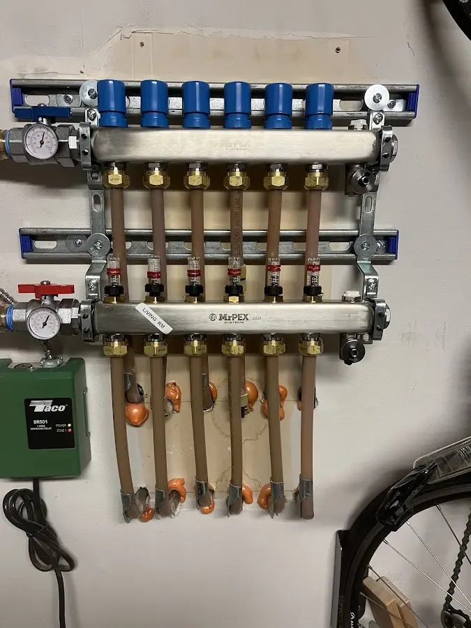 Plumber performing Water Heater Repair at a residential property in Eastampton